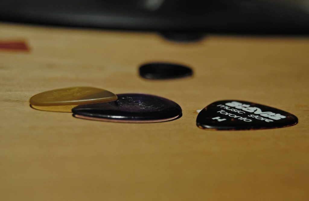 bass picks laying on table