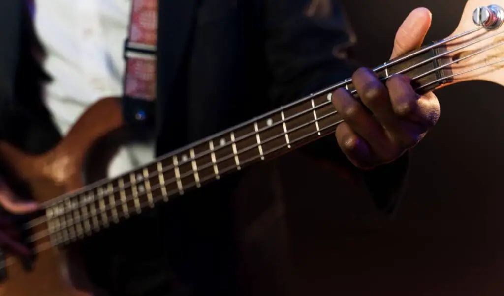 big bass with thin neck being played fingerstyle