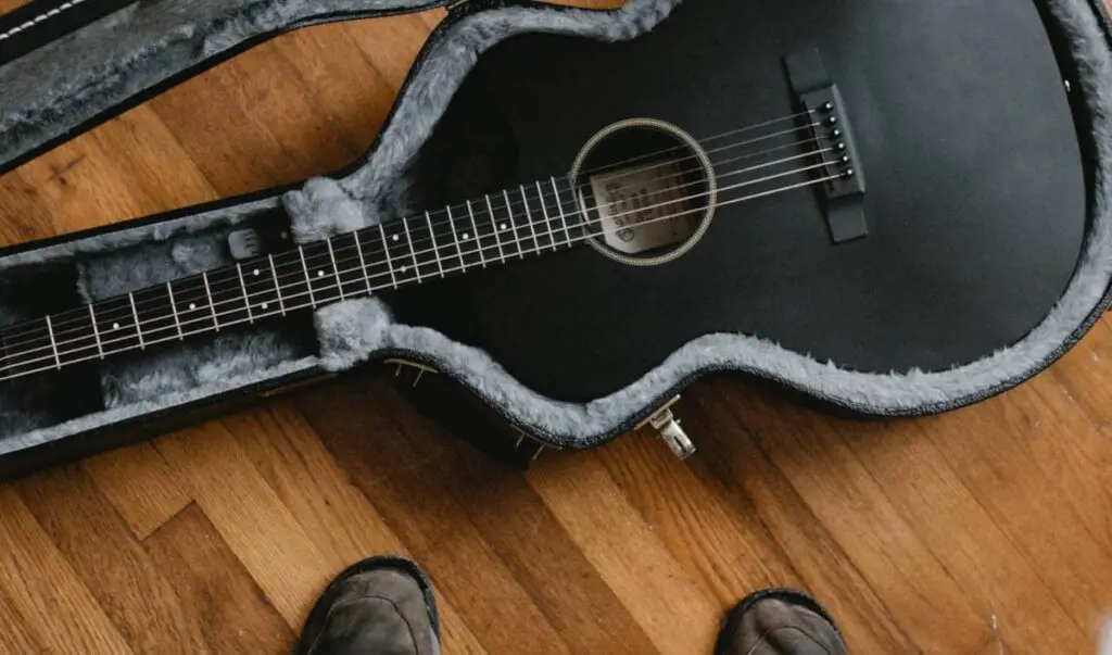 guitar getting put into bag