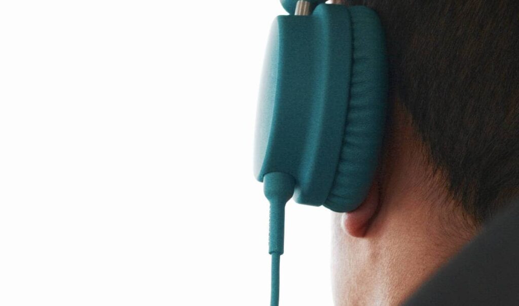 man listening to music on headphones