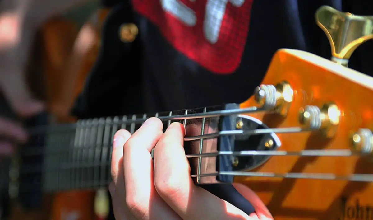 bassist practicing on 4-string bass