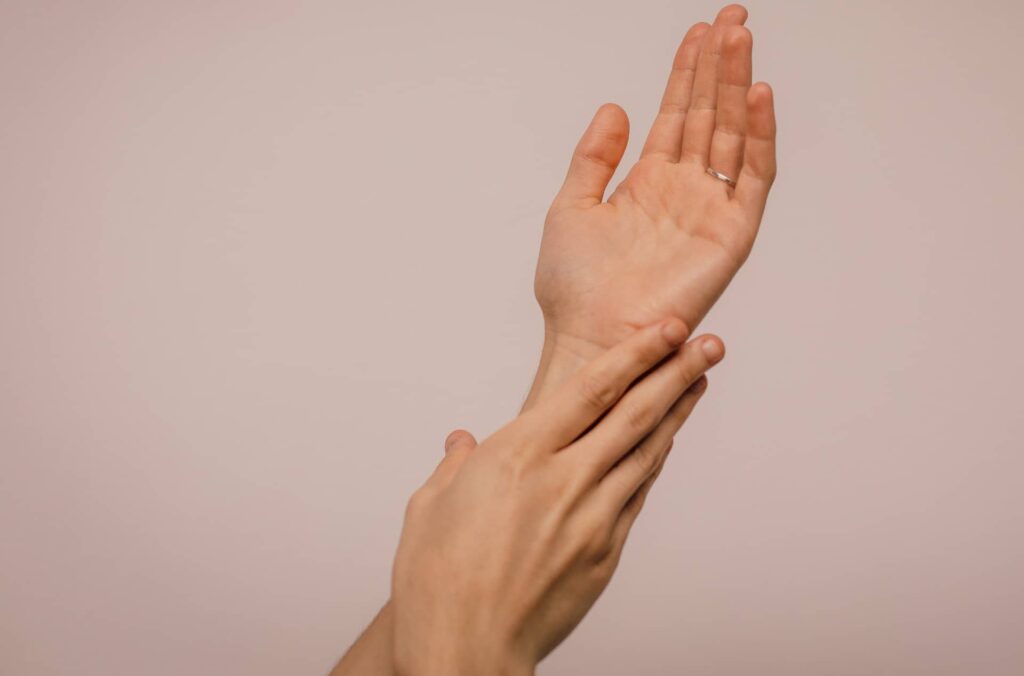 hand massage being aplied to painful wrist