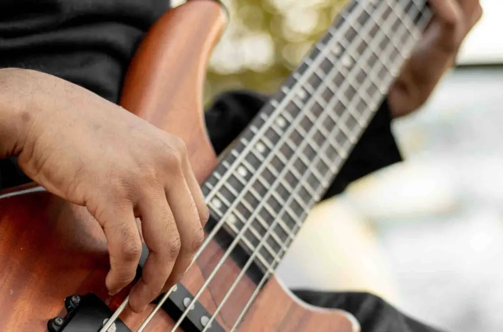 5-string bass being played fingerstyle