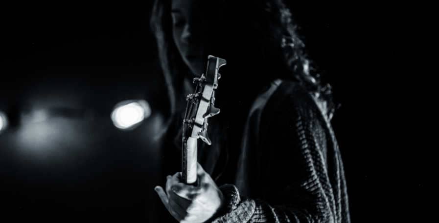 bass player concentrating during live show