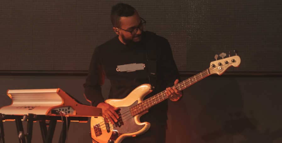 bass player playing 4-string bass