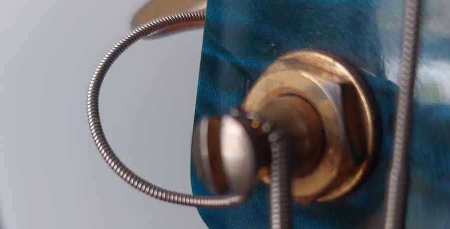bass string wrapped around tuning peg