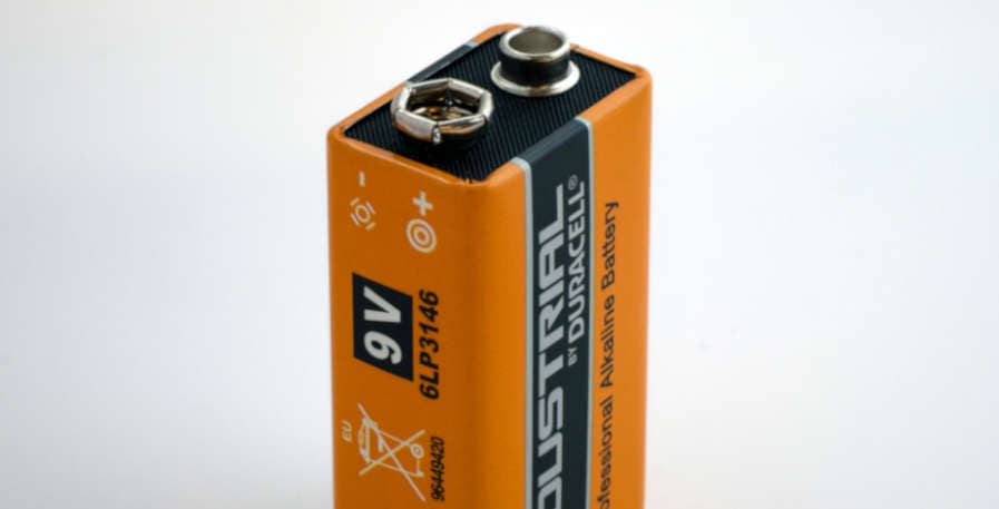 9v battery for active basses on white background