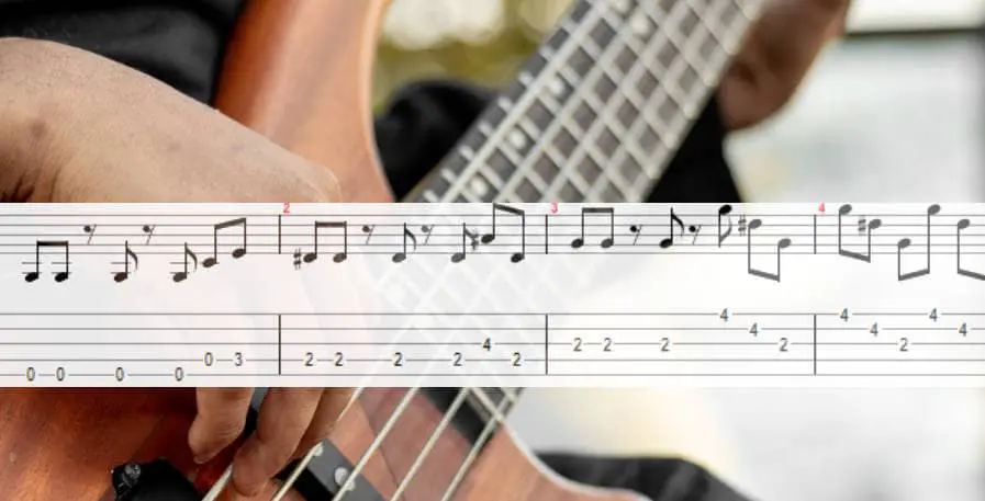 bassist playing a 5-string bass tab