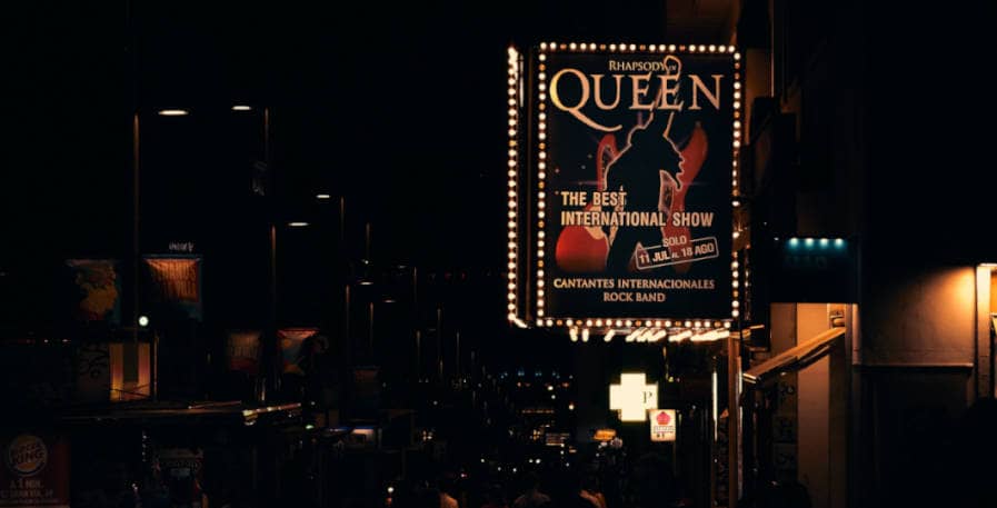 queen bilboard with shadow of freddie mercury