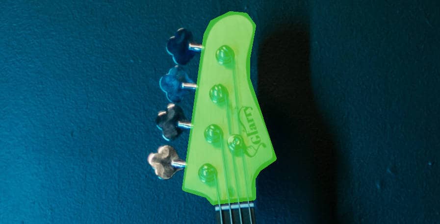 Headstock of a bass highlighted