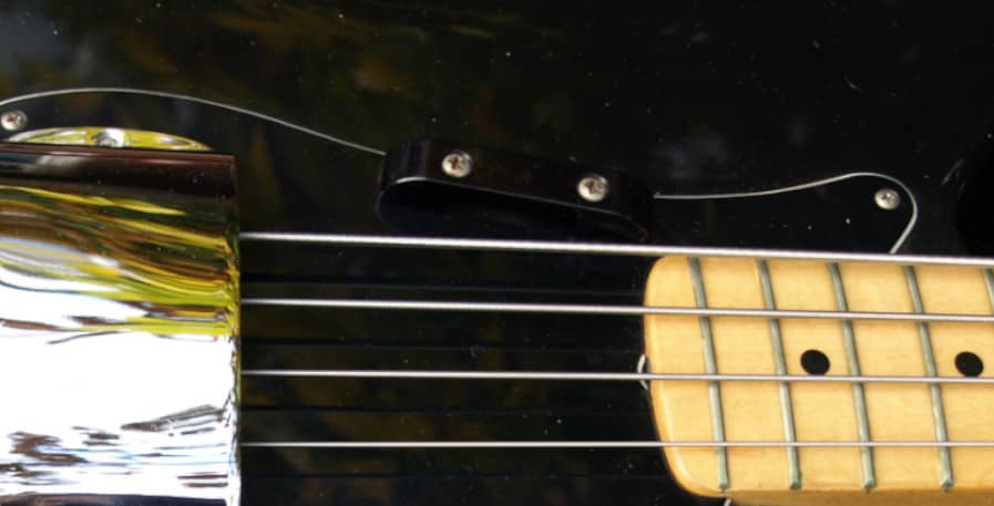 tug bar above the e string on a 1981 fender bass