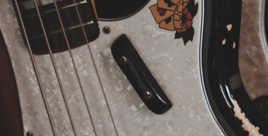 tug bar on a fender bass guitar